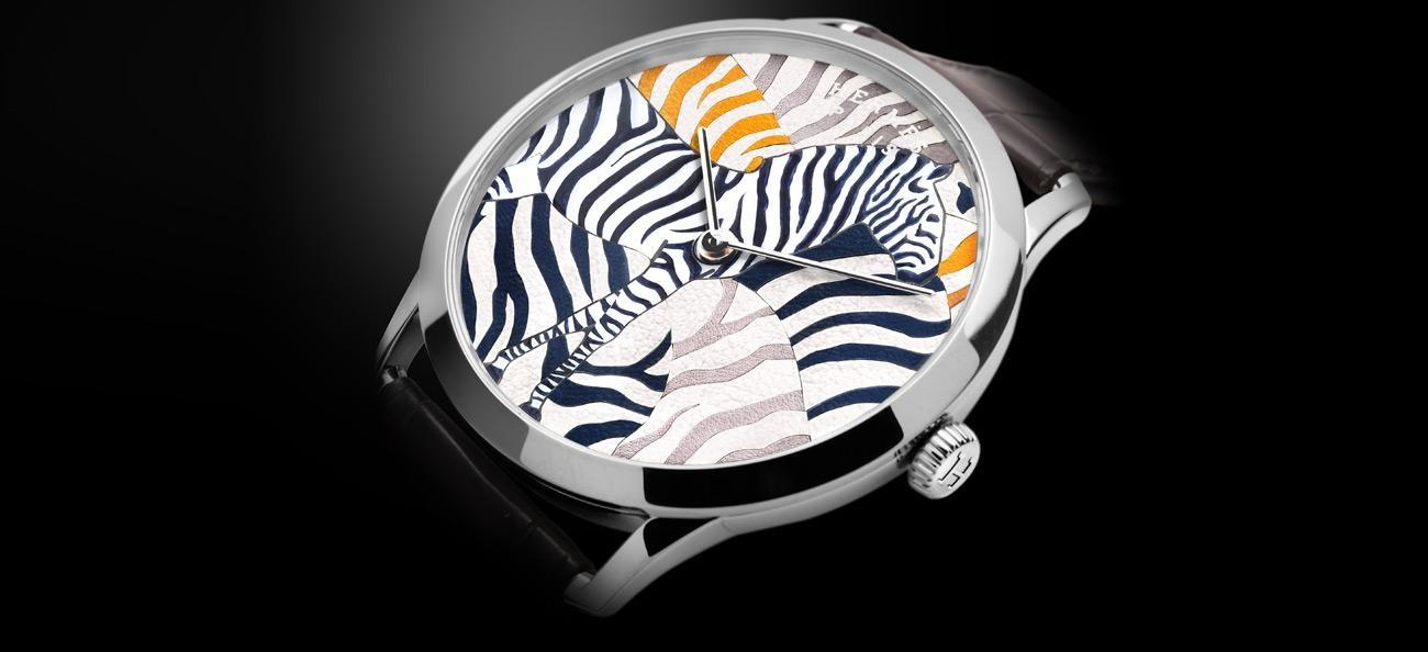 Hermès’ Slim d’ Hermès Les Zebres featuring leather marquetry