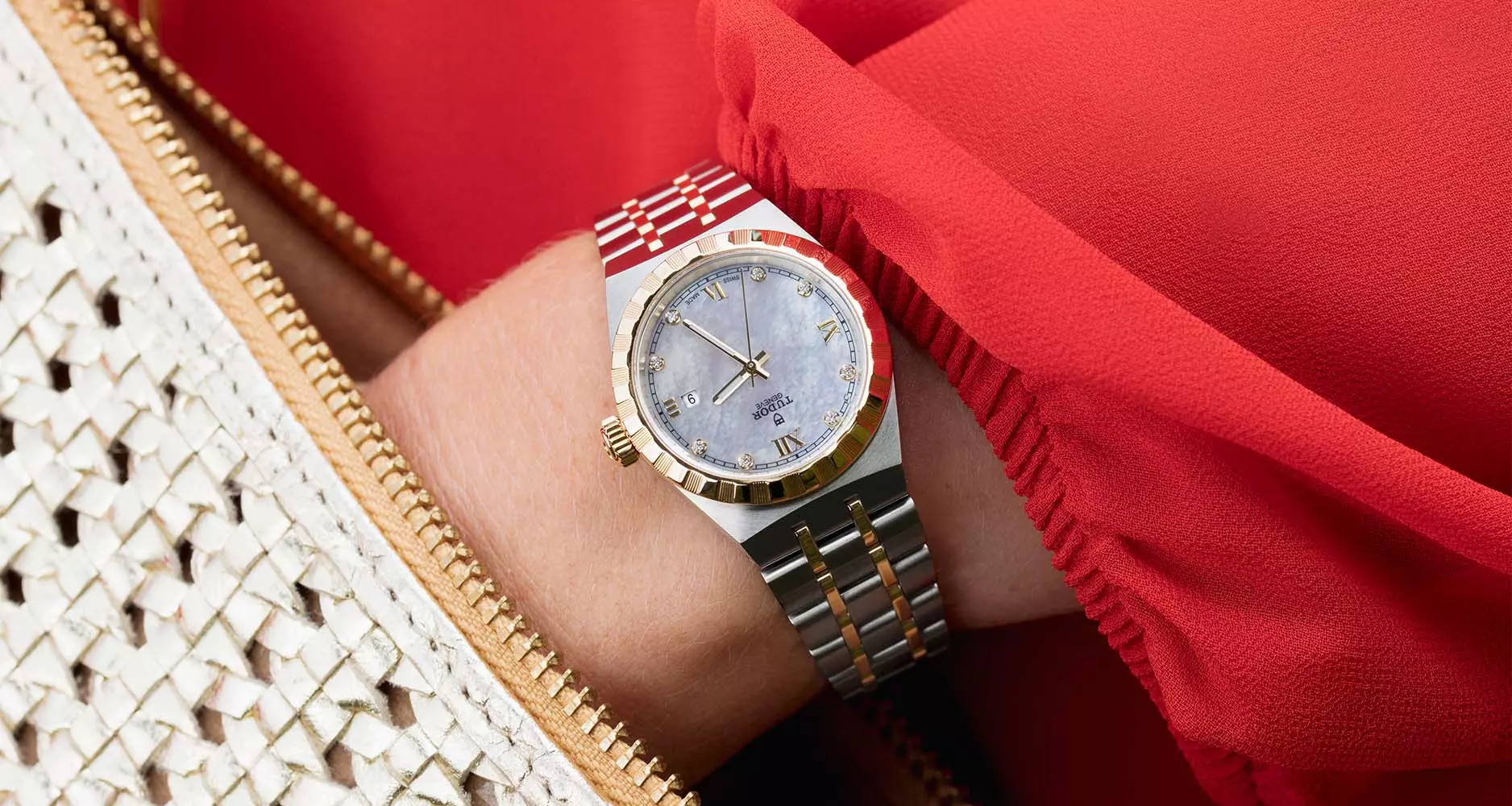 The Tudor Royal 34mm in stainless steel case with yellow gold bezel and mother-of-pearl dial.