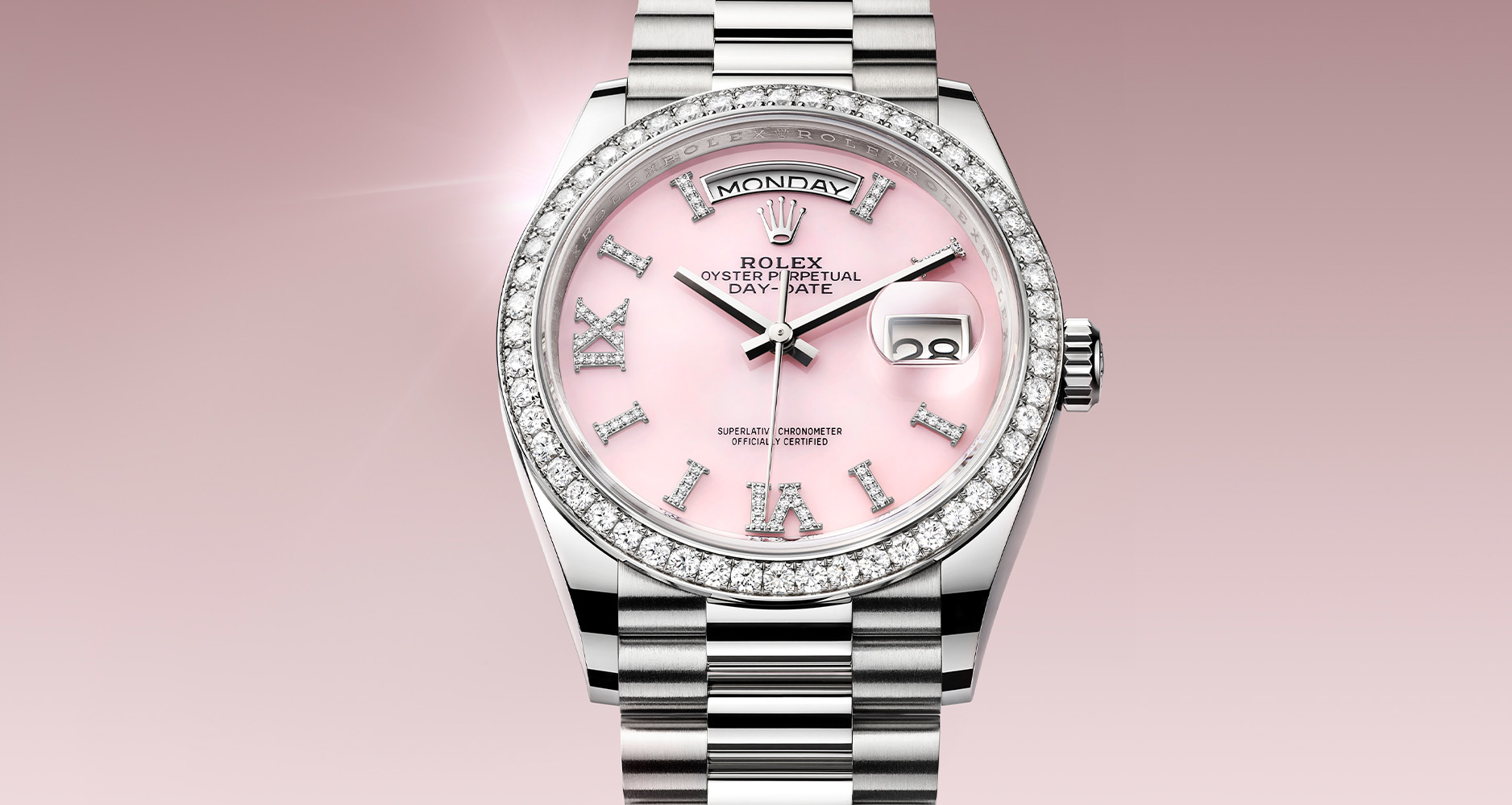 Rolex's Oyster Perpetual Day-Date 36 with diamond-set Roman numerals and pink opal dial is available with a white gold or platinum case and bracelet.