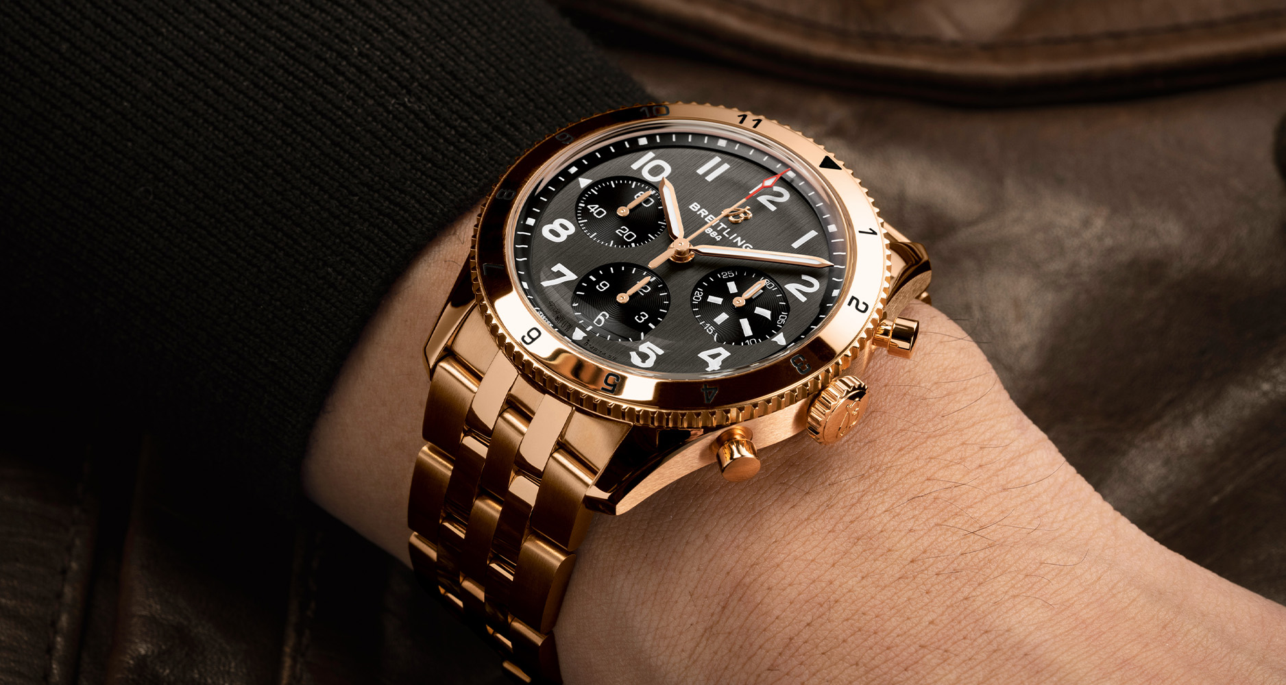 The Breitling Classic AVI Chronograph 42 P-51 Mustang in rose gold with full gold bracelet. 