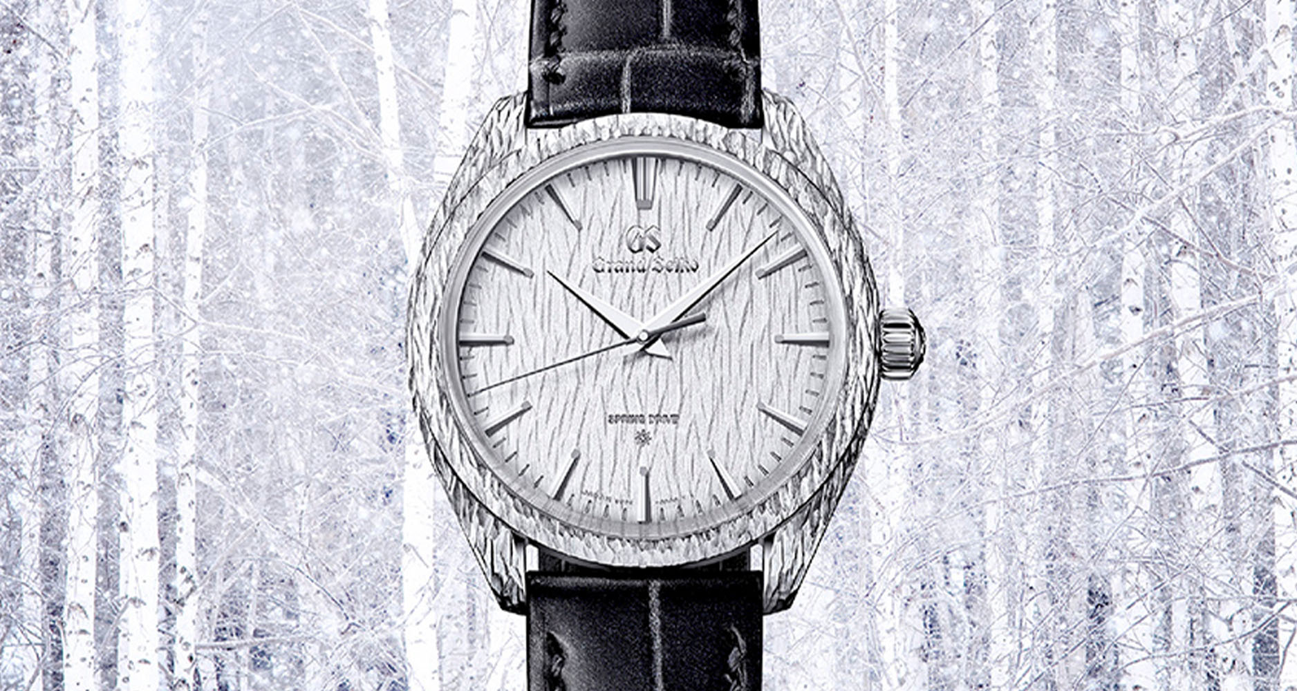 The white birch forest that inspired the Grand Seiko Masterpiece Limited Edition SBGZ009 can be seen in the back of this image.
