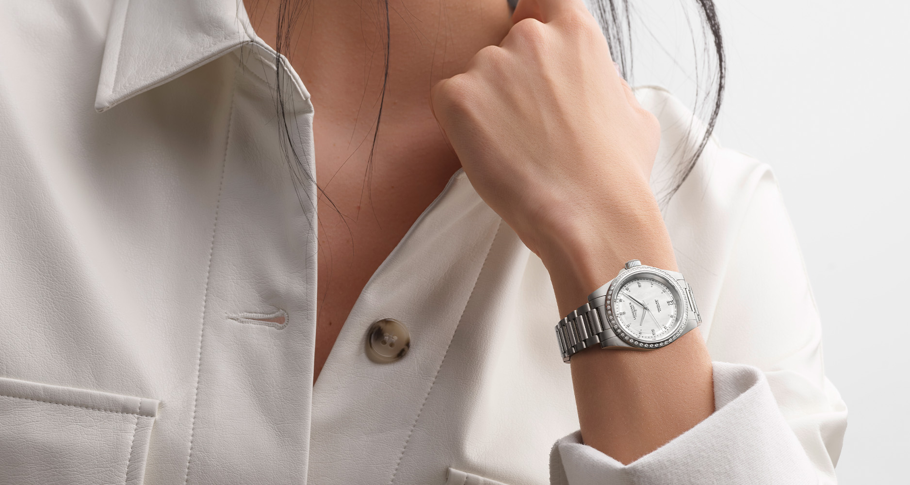 The Longines Conquest Automatic 34mm in steel case with mother-of-pearl dial.