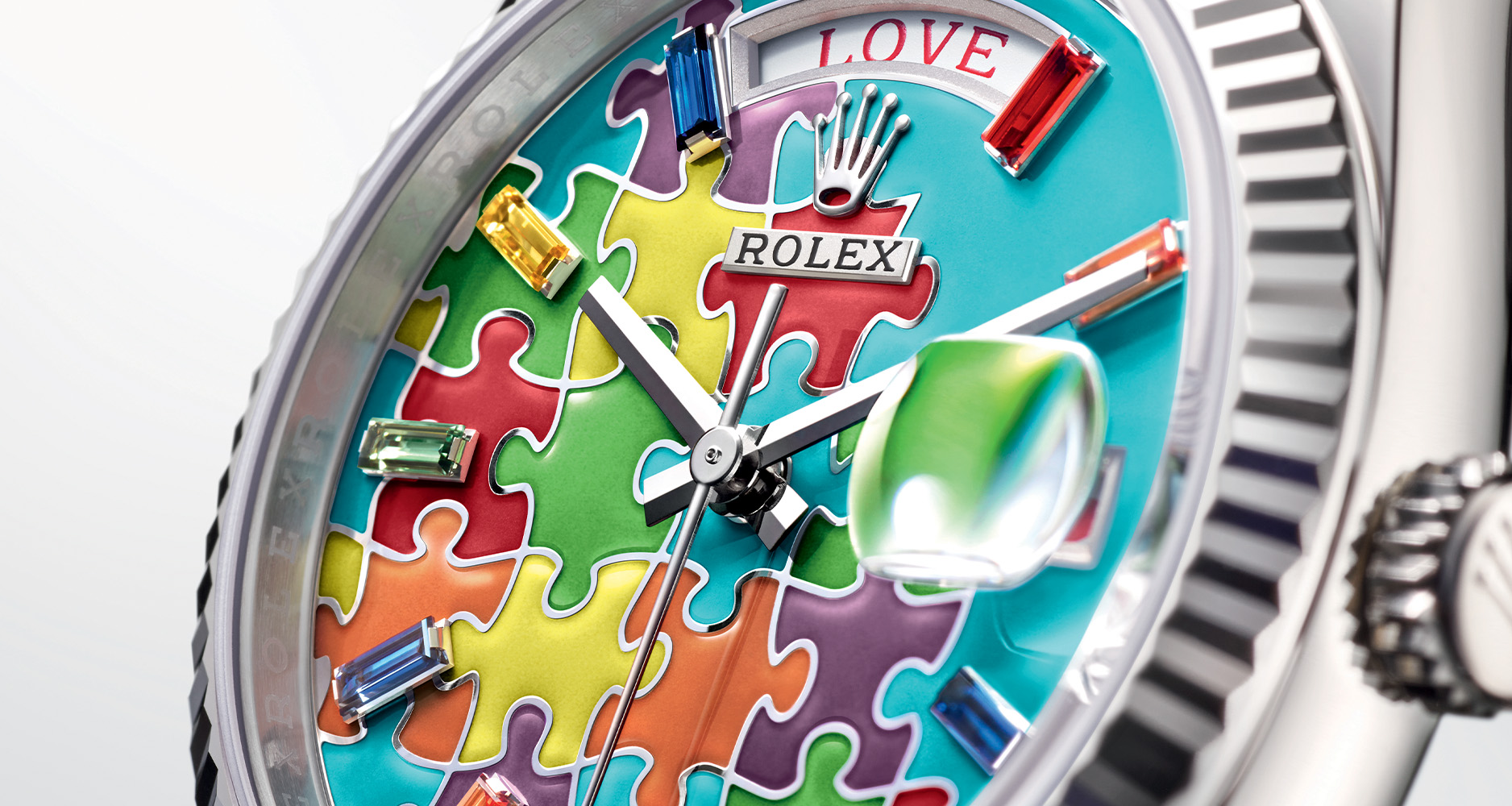 The baguette-cut sapphires that are the hour markers for the Rolex Oyster Perpetual Day-Date 36mm in white gold.