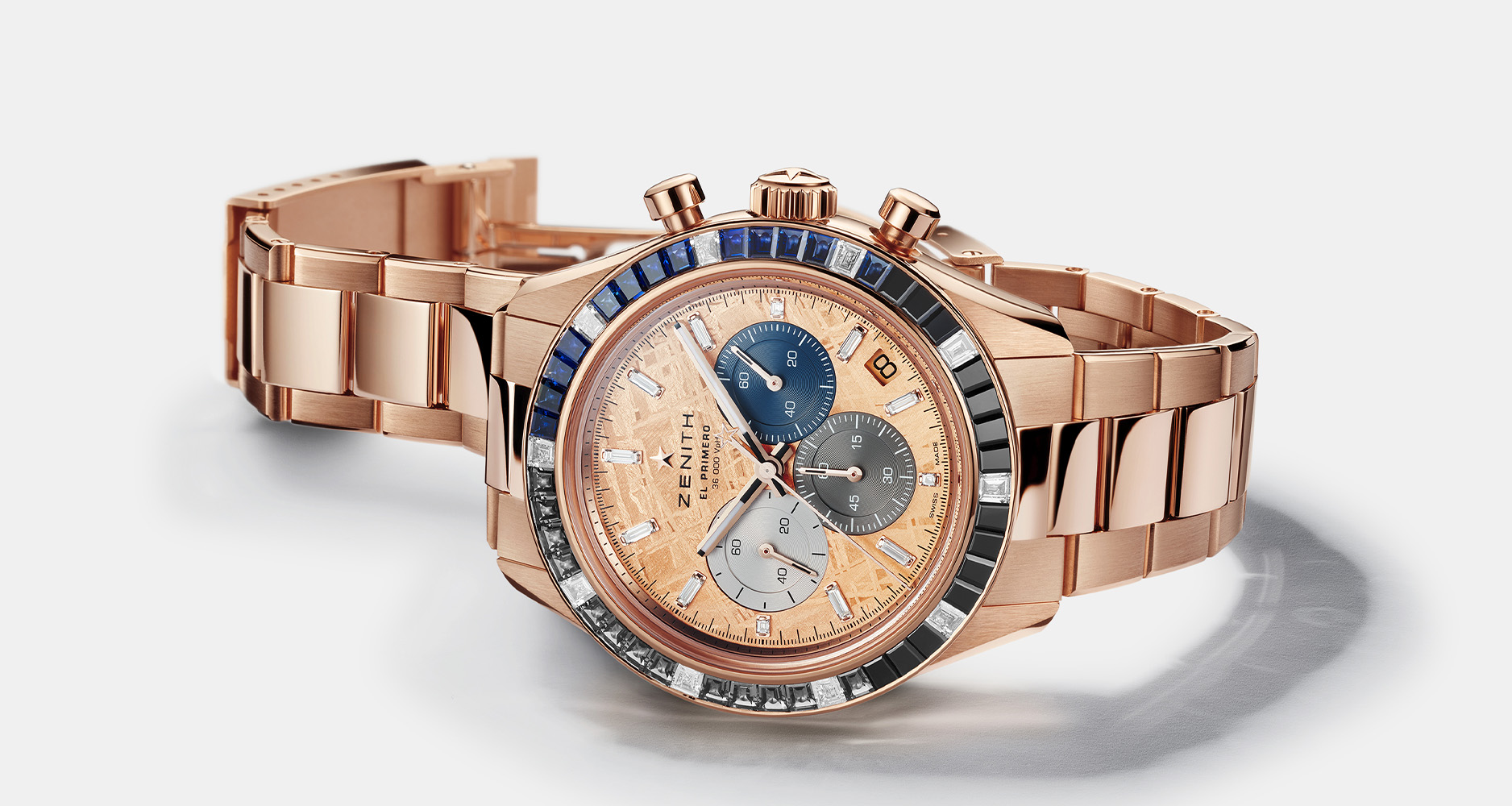 The Zenith Chronomaster Sport in rose gold case and bracelet with meteorite dial and gemset bezel.